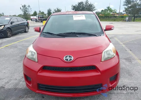 2012 Scion Xd z USA, uszkodzony, nr VIN JTKKU4B42C1020357
